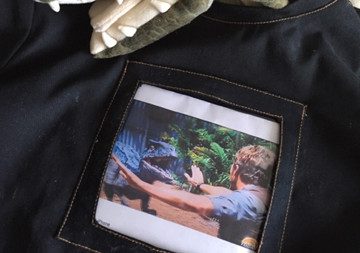 Dinosaur image on black fabric