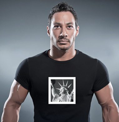 Person in graphic t-shirt posing confidently